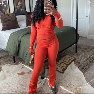 Orange tracksuit, medium, tall pants.
